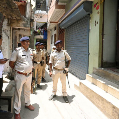 PATNA, INDIA - MAY 16: Police personnel stand guard at Jagat Villa Apartment after Bihar Economic Offences Unit (EOU) condusts raid at the residence of an executive engineer of Rural Works department Gopal Kumar in connection with alleged Rs. 2 crore disproportionate assets, on May 16, 2026 in Patna, India. (Photo by Santosh Kumar/Hindustan Times via Getty Images)
