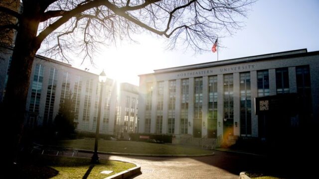sun filtering through buildings in centennial quad on Northeastern's Boston campus