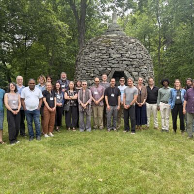 Attenders of the Buddhist Ethics Symposium in front of the Barre Center's stupa.