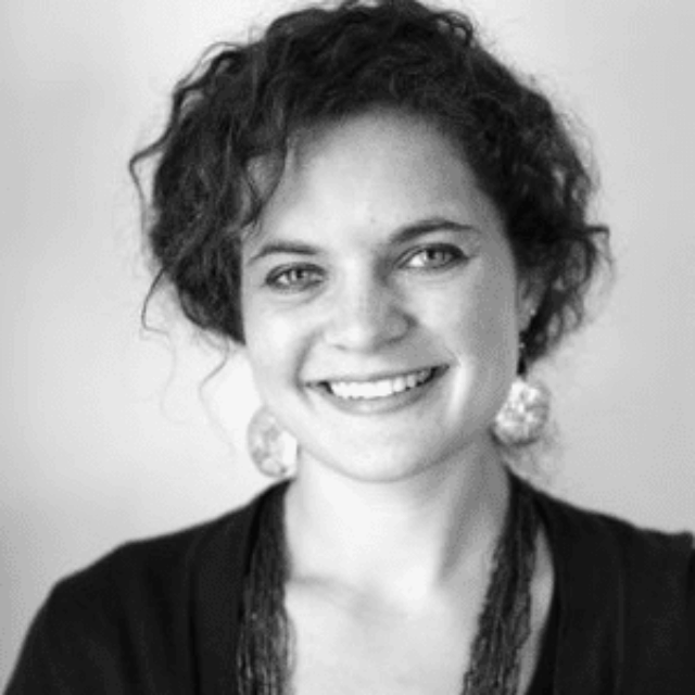 Black and white headshot of Julie Miller smiling