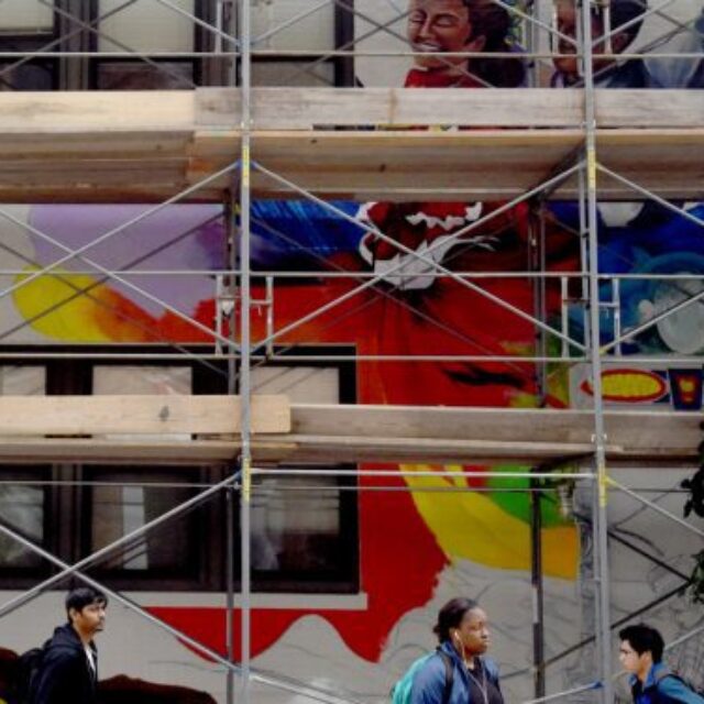 scaffold in front of mural