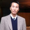 Image shows Professor Jung Lee in a suit.