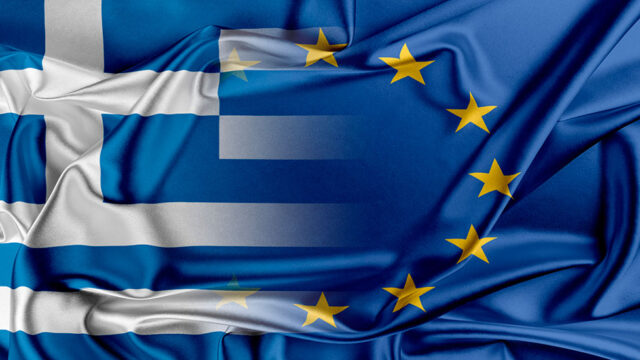 A photo of the Greek and European Union flags