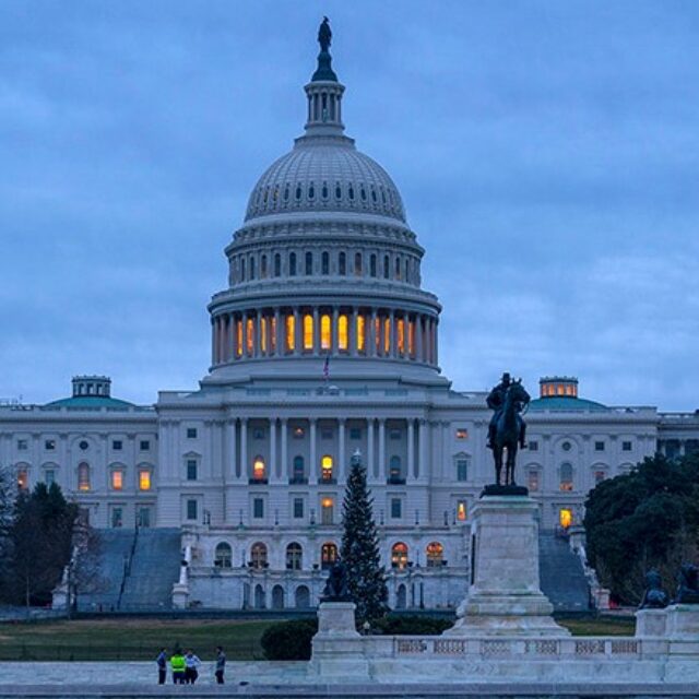The Capitol is seen under early morning skies in Washington, Thursday, Dec. 20, 2018. The Senate approved legislation to temporarily fund the government late last night, a key step toward averting a federal shutdown after President Donald Trump backed off his demand for money for a border wall with Mexico. The House is expected to vote before Friday's deadline, when funding for a portion of the government expires. Without resolution, more than 800,000 federal workers would face furloughs or be forced to work without pay, disrupting government operations days before Christmas. (AP Photo/J. Scott Applewhite)