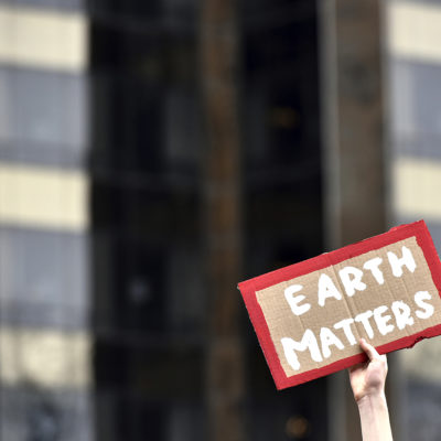 A protestpr holds up a sign during the U.S. Youth Climate Strike at Columbus Circle in New York, NY, March 15, 2019. Thousands of students around the world skipped school Friday to protest lack of action on climate change.