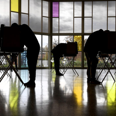 Voters mark their ballots at First Presbyterian Church on Election Day, Tuesday, Nov. 3, 2020, in Stamford, Conn.