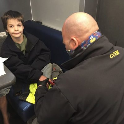 In this photo provided by the Tennessee Bureau of Investigation, 9-year-old Jordan Gorman is checked out by a Tennessee Bureau of Investigation employee after he was found in the woods near his home, Tuesday, Nov. 17, 2020, in Ashland City, Tenn.