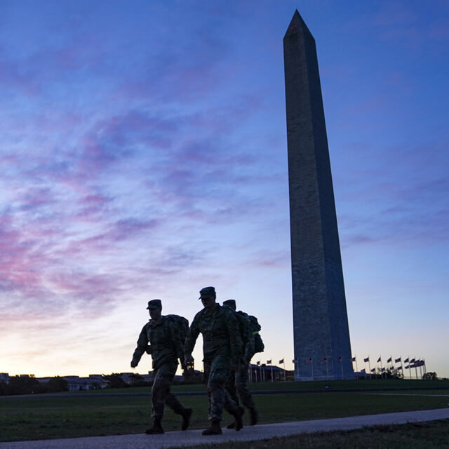United States National Guard members walk towards the White House from the Washington Monument on Election Day, Tuesday, Nov. 3, 2020, in Washington.
