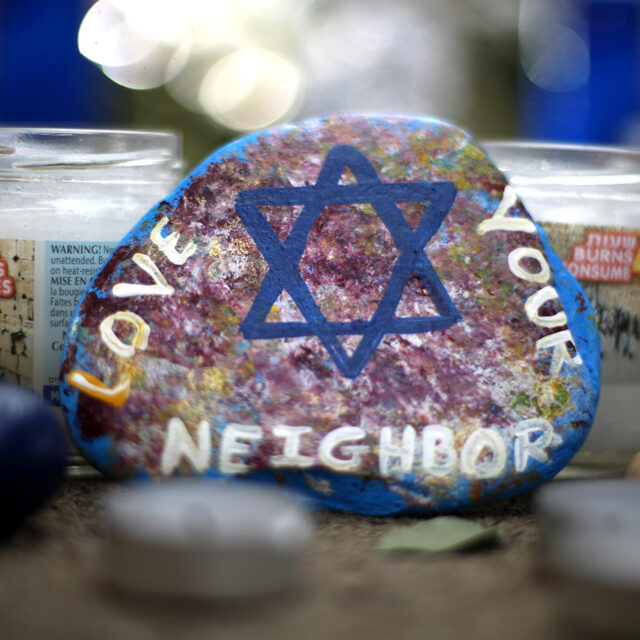 This Wednesday, Oct. 31, 2018, file photo, shows a painted rock found as part of a makeshift memorial outside the Tree of Life Synagogue in the Squirrel Hill neighborhood of Pittsburgh, in honor of the people killed during worship services several days earlier.