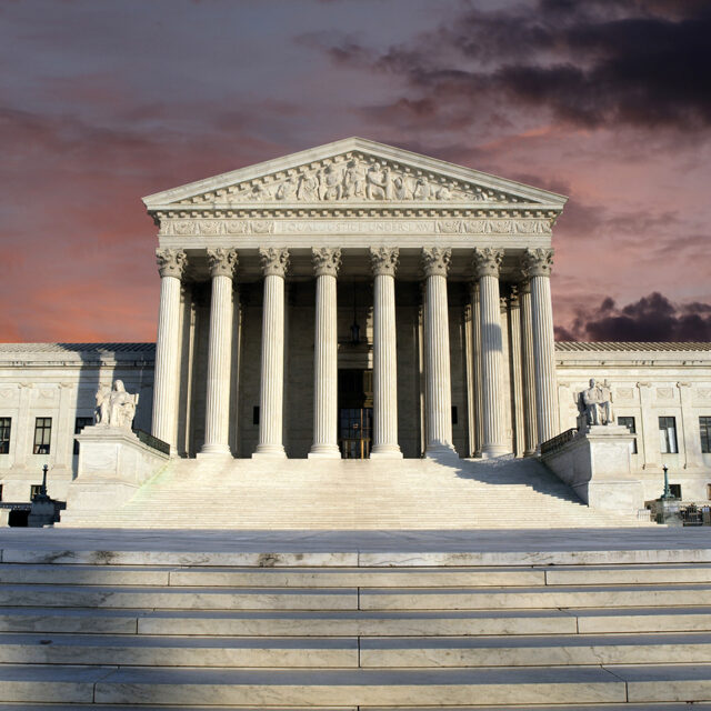 Clearing morning storm sky with the United States Supreme Court building in Washington DC.