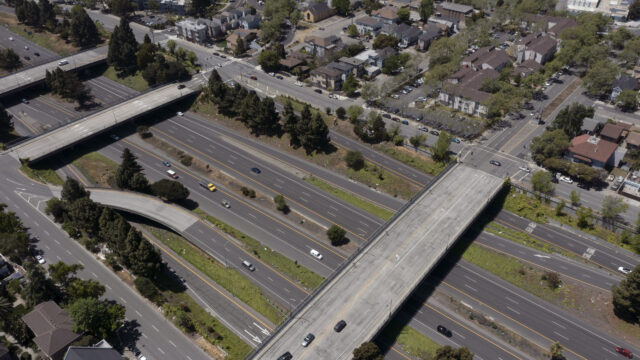 Interstate 980 and the 14th Street, 12th Street and 11th Street overpasses, from right, are seen from this drone view looking towards West Oakland, Calif., on Tuesday, May 4, 2021.