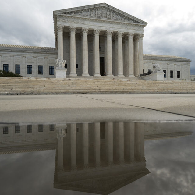 UNITED STATES - SEPTEMBER 23: The U.S. Supreme Court building reflects in a rain puddle in Washington on Thursday, Sept. 23, 2021.