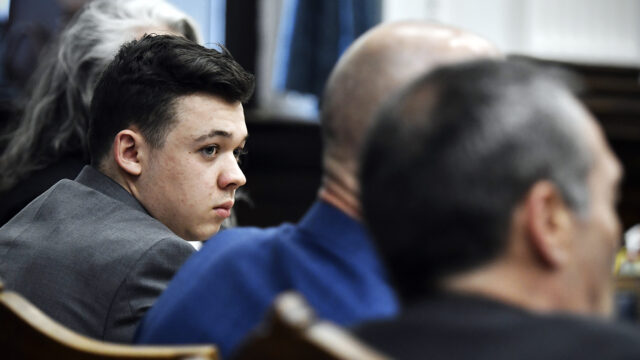 Kyle Rittenhouse listens as attorneys discuss the potential for a mistrial at the Kenosha County Courthouse in Kenosha, Wis., on Wednesday, Nov. 17, 2021.