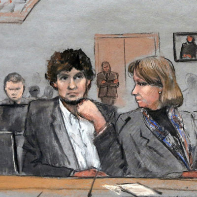 In this March 5, 2015 file courtroom sketch, Dzhokhar Tsarnaev, center, is depicted between defense attorneys Miriam Conrad, left, and Judy Clarke, right, during his federal death penalty trial in Boston.