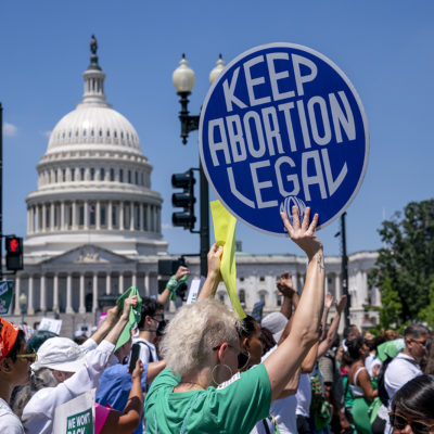 Abortion-rights activists demonstrate against the Supreme Court decision to overturn Roe v. Wade that established a constitutional right to abortion, on Capitol Hill in Washington, Thursday, June 30, 2022.