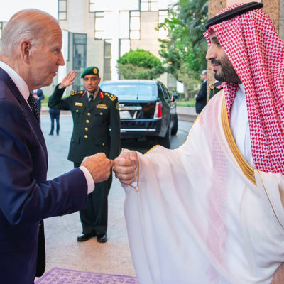 In this image released by the Saudi Royal Palace, Saudi Crown Prince Mohammed bin Salman, right, greets President Joe Biden with a fist bump after his arrival in Jeddah, Saudi Arabia, Friday, July 15, 2022.