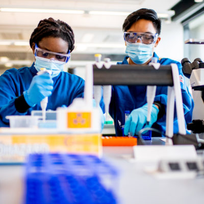 9/23/21- BOSTON, MA - Sheila Sossavi, left, and Joseph Labrador, both students in the bioengineering measurement, experimentation, and statistics course, work on a lab assignment in the Interdisciplinary Science and Engineering Complex.
