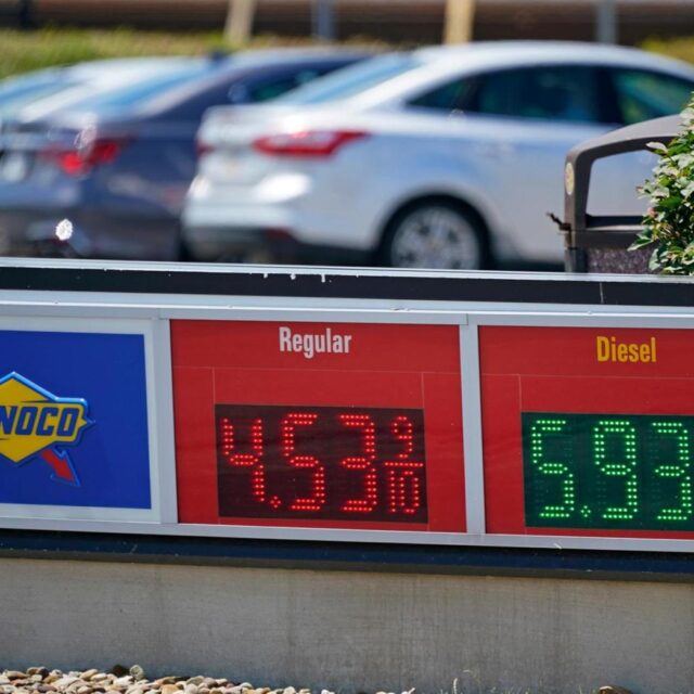 FILE – Gas prices are displayed at a Sunoco gas station along the Ohio Turnpike near Youngstown, Ohio, Tuesday, July 12, 2022. Thanks largely to falling gas prices, the government’s inflation report for July, to be released Wednesday, Aug. 10, 2022, will probably show that prices jumped 8.7% from a year earlier, according to a survey of economists by data provider FactSet.