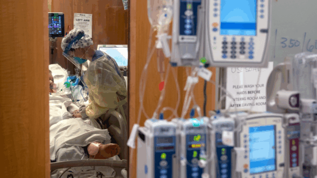 A nurse tends to a COVID-19 patient in a Stamford Hospital intensive care unit on April 24, 2020, in Stamford, Connecticut.