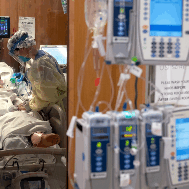 A nurse tends to a COVID-19 patient in a Stamford Hospital intensive care unit on April 24, 2020, in Stamford, Connecticut.