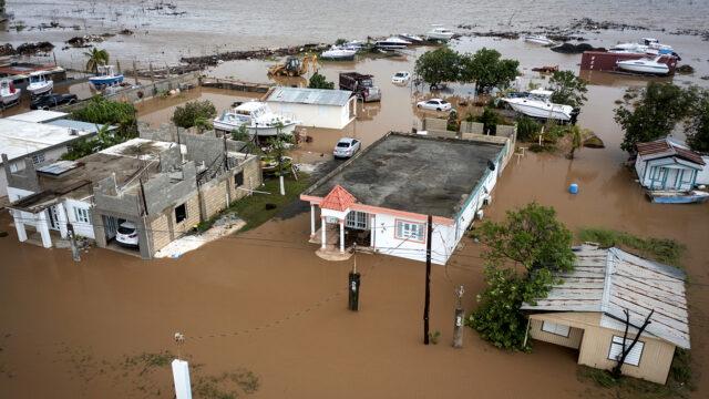 Homes are flooded on Salinas Beach after the passing of Hurricane Fiona in Salinas, Puerto Rico, Monday, Sept. 19, 2022.