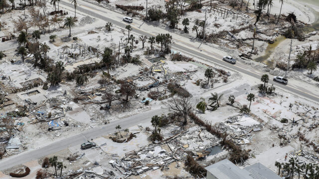In this aerial view captured from a helicopter, the destruction left in the wake of Hurricane Ian is shown on Saturday, Oct. 8, 2022, in Fort Myers Beach, Florida. Fort Myers Beach sustained severe damage from the Category 4 hurricane, which caused extensive damage to the southwest portion of Florida.
