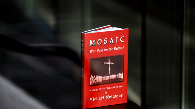 11/08/22 - BOSTON, MA. - Northeastern professor Michael Meltsner’s most recent book, “Mosaic: Who paid for the Bullet?” on Nov. 8, 2022. Photo