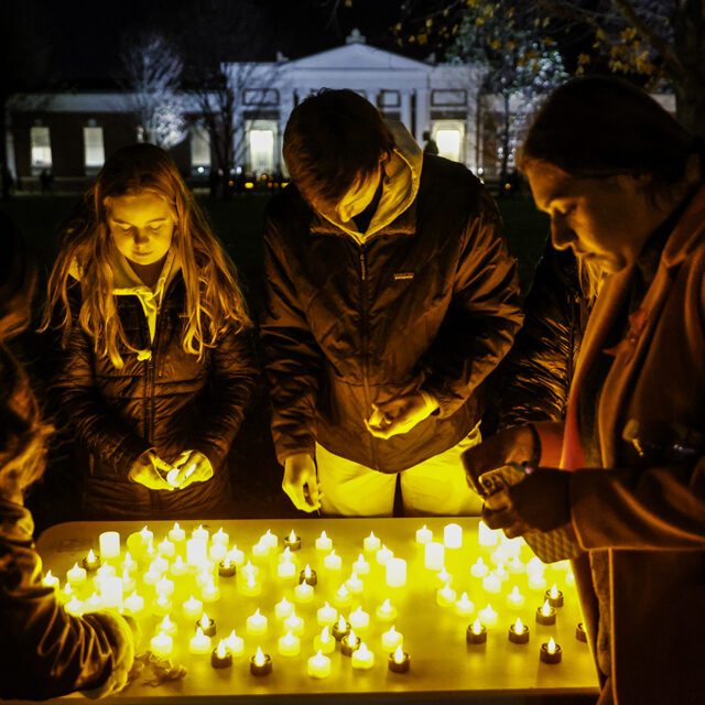Students and community members gather for a candlelight vigil after a shooting that left three students dead the night before at the University of Virginia, Monday, Nov. 14, 2022, in Charlottesville, Va.