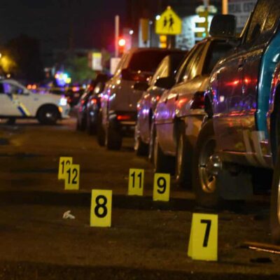 Evidence markers indicating shell casings after a mass shooting in Philadelphia, Pennsylvania, on 3 July 2023.