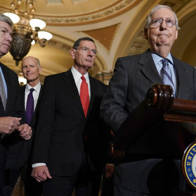 Senate Minority Leader Mitch McConnell, R-Ky., right, joined by from left, Sen. Roy Blunt, R-Mo., Sen. Rick Scott, R-Fla., Sen. John Barrasso, and Sen. Joni Ernst, R-Iowa, pauses as he speaks during a news conference on Capitol Hill in Washington.