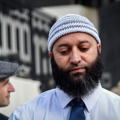 Adnan Syed cries as he speaks to reporters outside the Robert C. Murphy Courts of Appeal building after a hearing on Feb. 2, 2023.