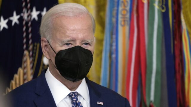 President Joe Biden wearing an N95 mask.