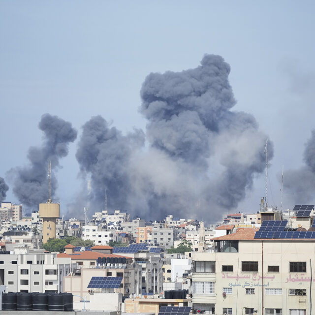 Smoke rises from an explosion caused by an Israeli airstrike in the Gaza Strip, Saturday, Oct. 7, 2023.
