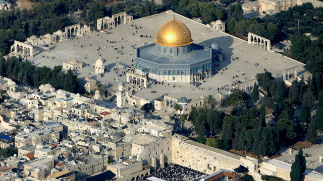Aerial view of Muslim worshippers gathering outside the Dome of the Rock Mosque, in the Al Aqsa Mosque compound.
