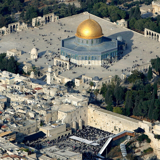Aerial view of Muslim worshippers gathering outside the Dome of the Rock Mosque, in the Al Aqsa Mosque compound.