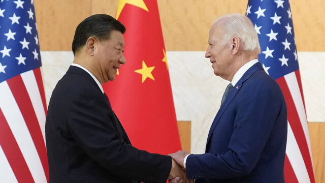 President Joe Biden, right, and Chinese President Xi Jinping shake hands before their meeting on the sidelines of the G20 summit meeting in Nusa Dua, in Bali, Indonesia on Nov. 14, 2022.
