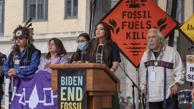 A woman from the Indigenous people community speaks during a rally titled 'March to End Fossil Fuels' in New York City.