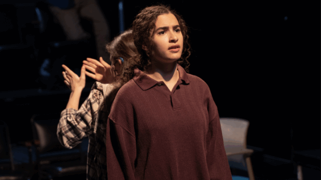 Halle performing in a production of 