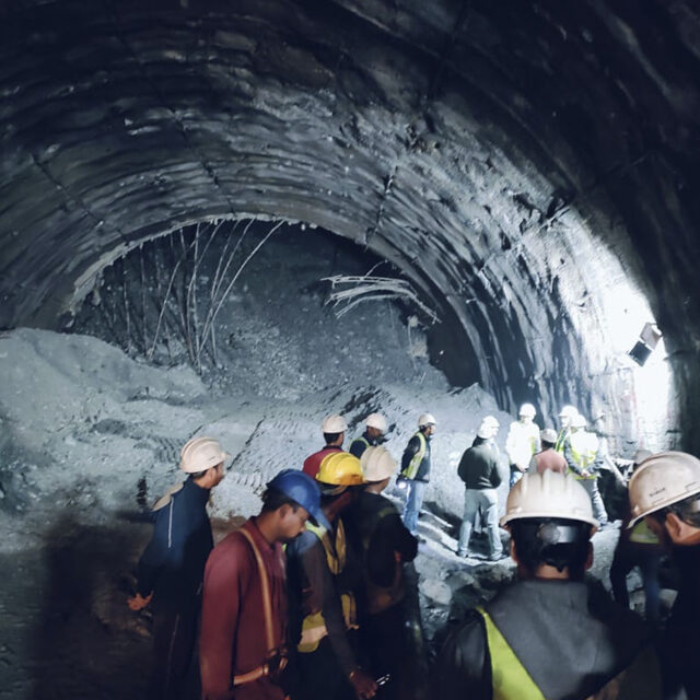 This photo provided by Uttarakhand State Disaster Response Force (SDRF) shows rescuers inside a collapsed road tunnel where more than 30 workers were trapped by a landslide in northern in Uttarakhand state, India, Sunday, Nov.12, 2023.
