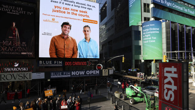 A Safe Horizon PSA about the Adult Survivors Act plays in Times Square during a press conference on the new law, Friday, Nov. 18, 2022, in New York.