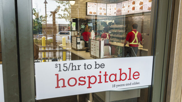 Columbia South Carolina, Chick-fil-A, fast food restaurant with sign advertising $15 an hour to be hospitable.