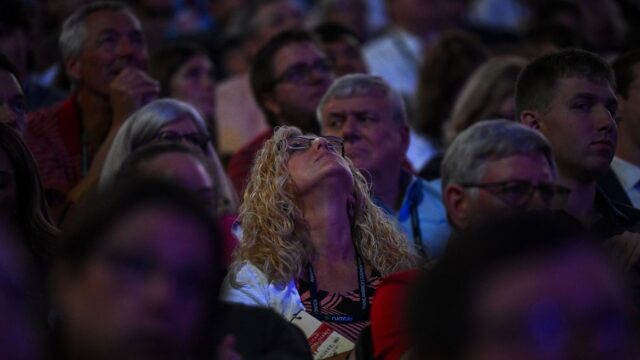 People gather for a Republican presidential debate hosted on Aug. 23 in Milwaukee.