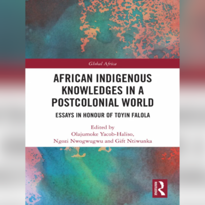 image of book cover with title and colorful world map behind