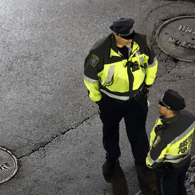 image of two boston police standing outside in the street