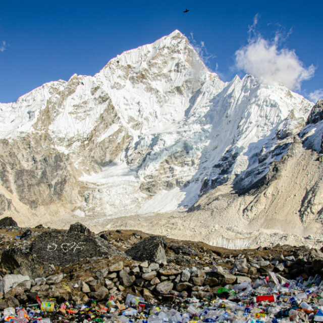 image of plastics under a mountain range
