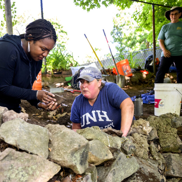 image of Kabria Baumgartner, Dean’s Associate Professor of History and Africana Studies works on the site of what archeologists believe is the home of King Pompey, on June 4, 2024. Photo by Matthew Modoono/Northeastern University
