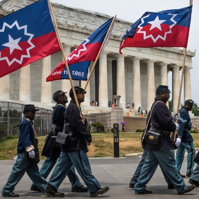 Members of a Civil War re-enactment troop are seen in front of the Lincoln Memorial during Juneteenth celebrations in Washington, D.C., in 2023. Photo: Aaron Schwartz/Xinhua via Getty Images