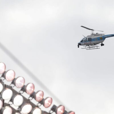 A helicopter flies over Wrigley Field searching for gunman on June 17, 2024.