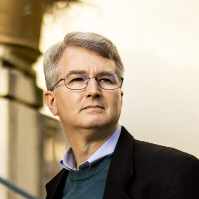 Mark Henderson, professor of public policy, poses for a portrait on December 2, 2021. Photo by Ruby Wallau for Northeastern University