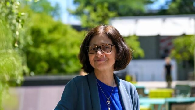 Wendy Parmet, Matthews Distinguished University Professor of Law and Faculty Director, Center for Health Policy and Law, poses for a rooftop portrait on Northeastern University’s Boston campus.